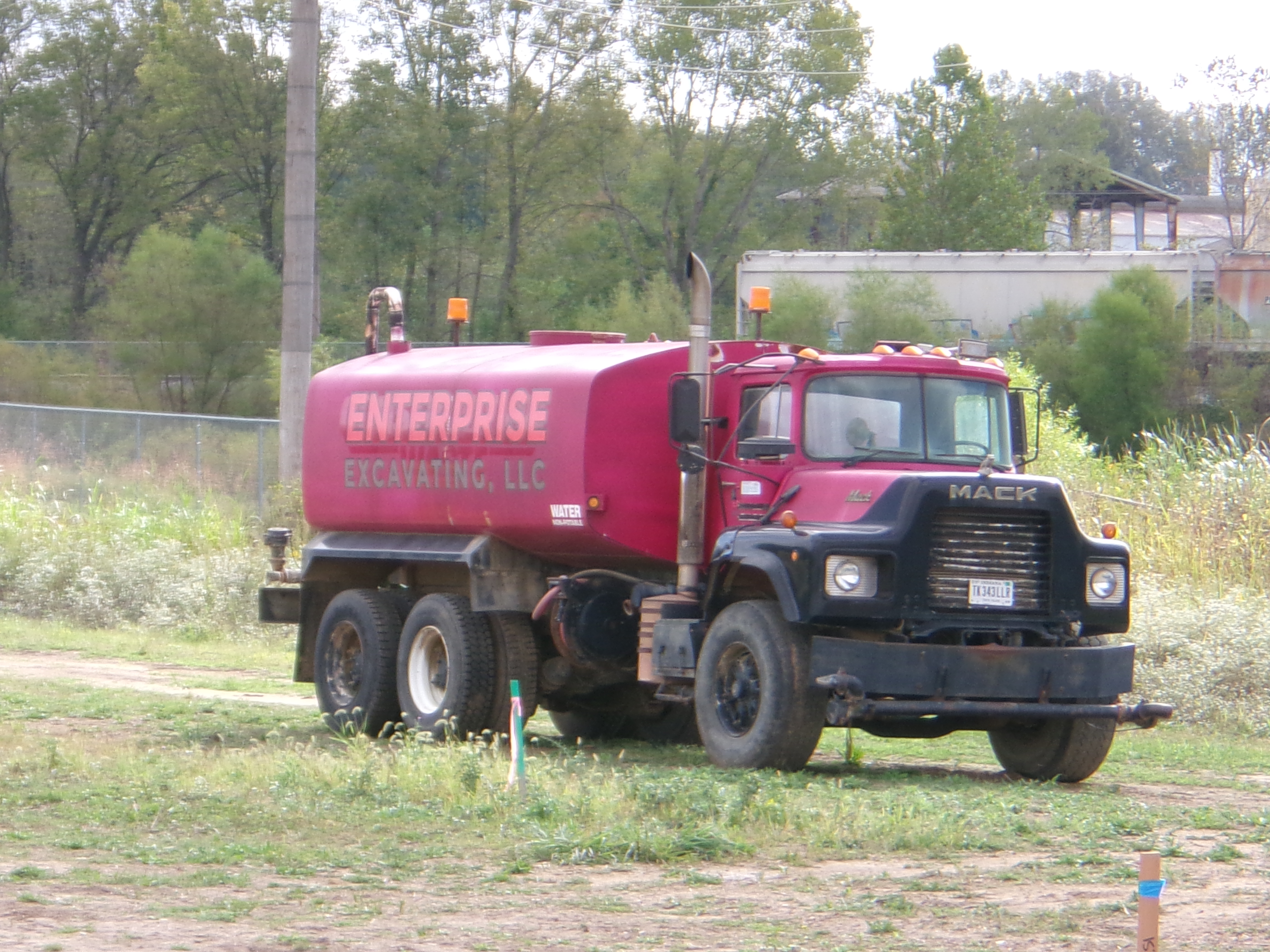 Red Enterprise Excavating truck 
